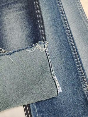 پارچه جین کشی فوق العاده کشسان پنبه پلی استر ریون با وزن 11 اونس، بافت جناغی، برای شلوار جین مردانه